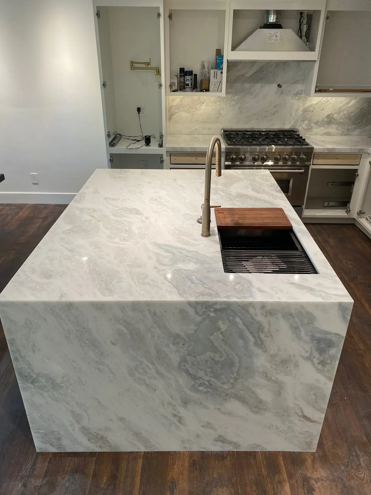 Dolomite waterfall island with 2-inch mitered edges and an undermount sink in an Incline Village kitchen